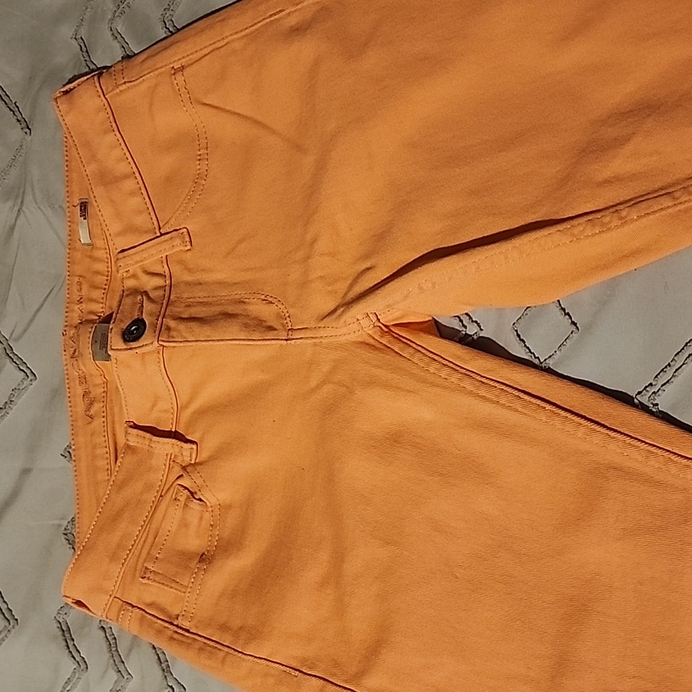 Arizona jeans, super skinny, Size 7, with hems at the bottle.
